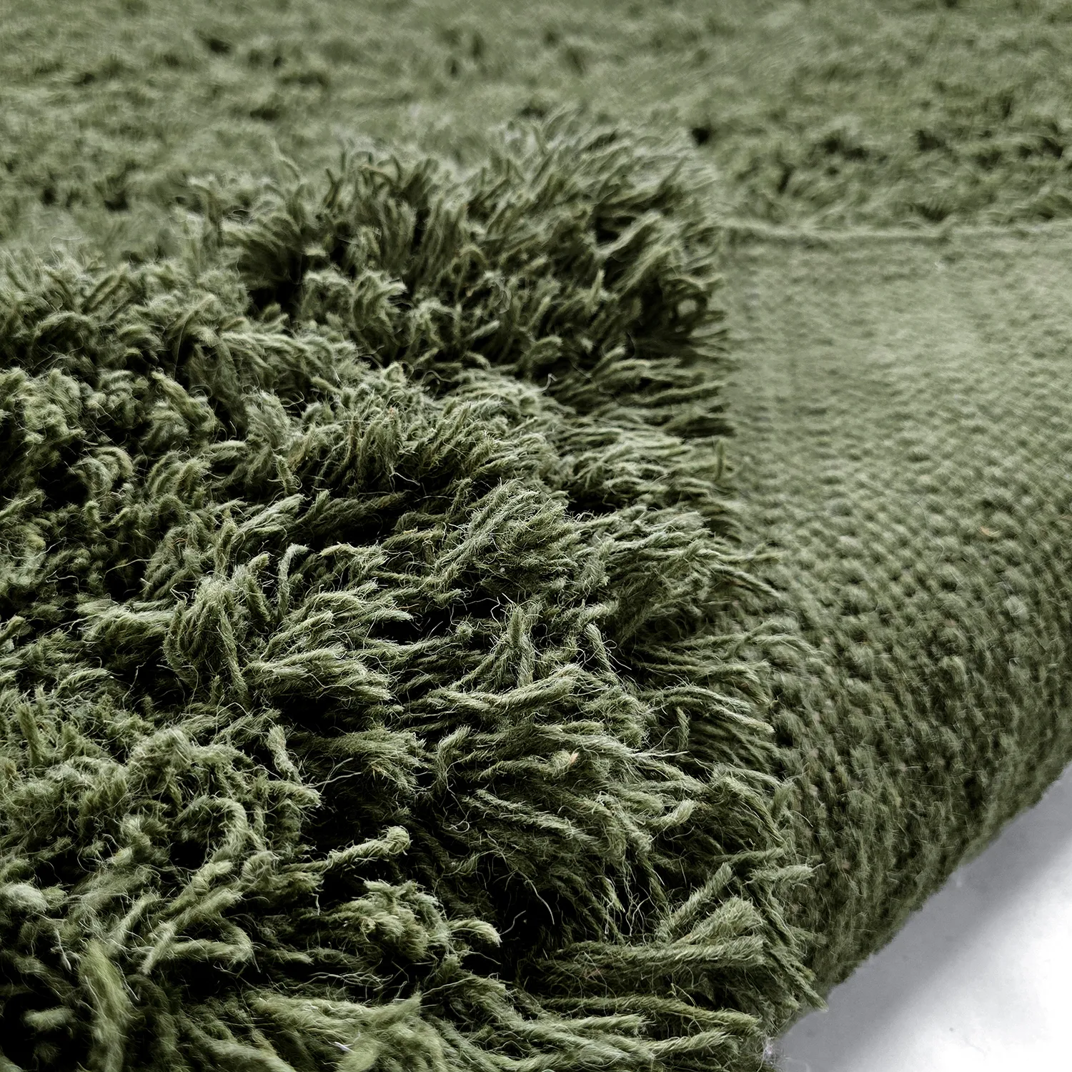 Ryamatta - Fassale Hand Woven Wool Shaggy (mossgrön)