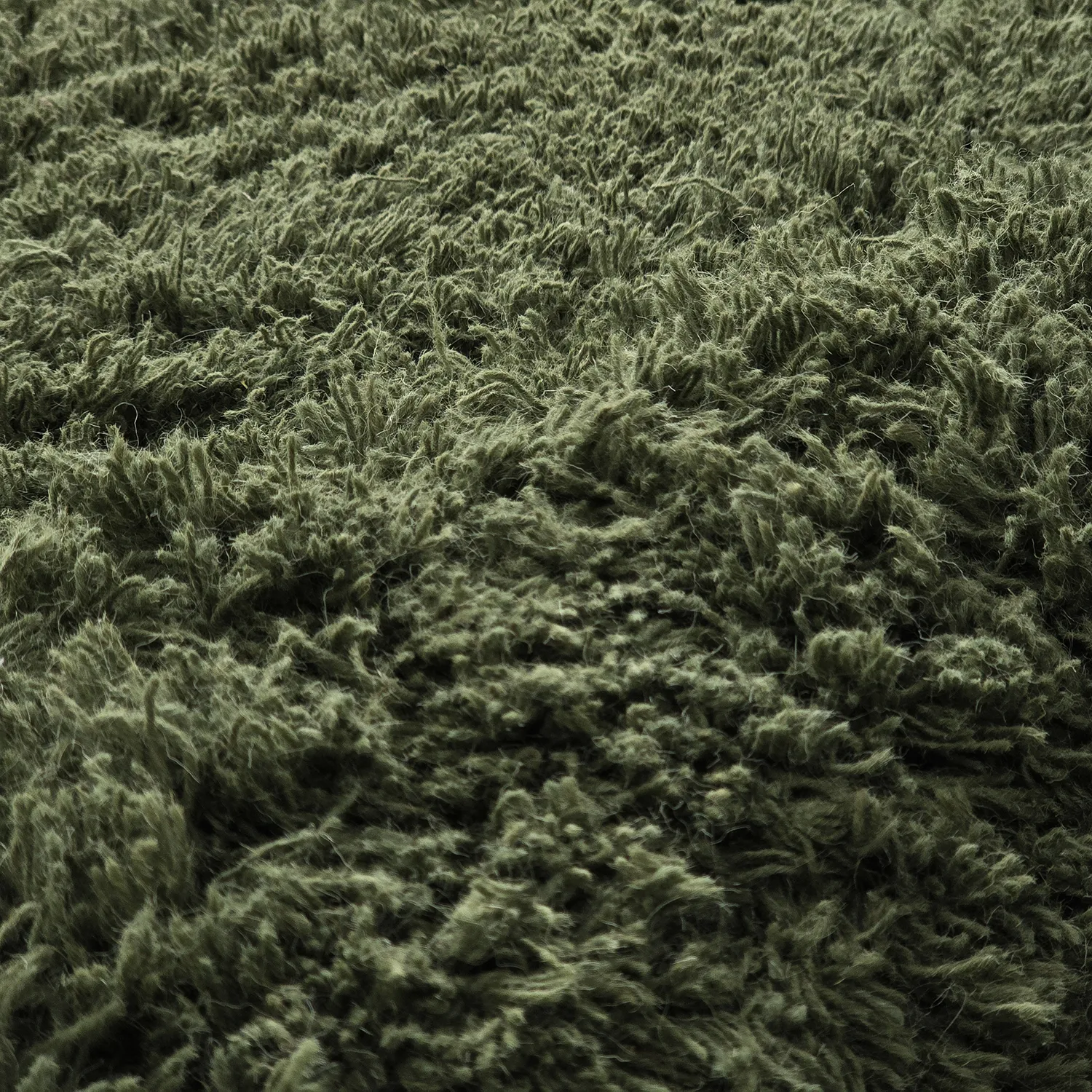 Ryamatta - Fassale Hand Woven Wool Shaggy (mossgrön)