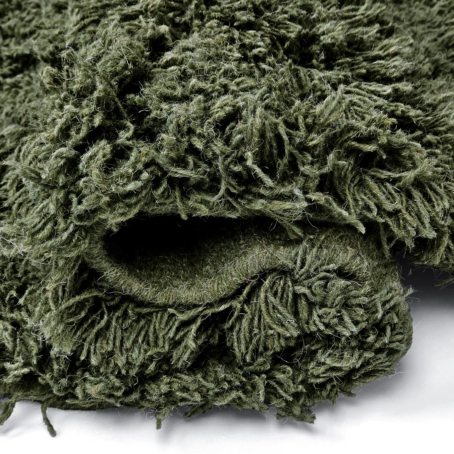Rund matta - Fassale Hand Woven Wool Shaggy (mossgrön)